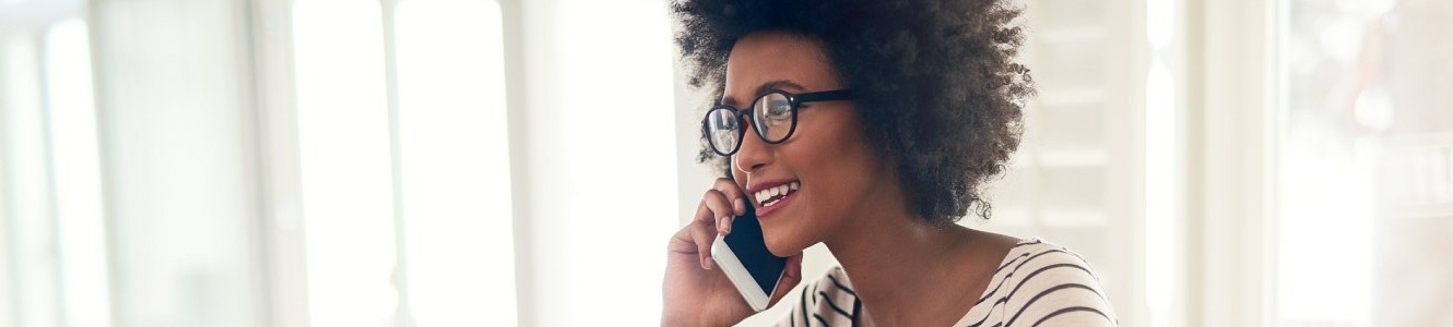 Woman talking on phone.