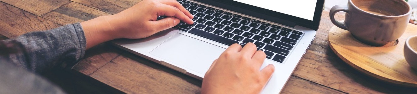 Person typing on a computer