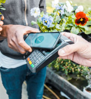 person paying with phone