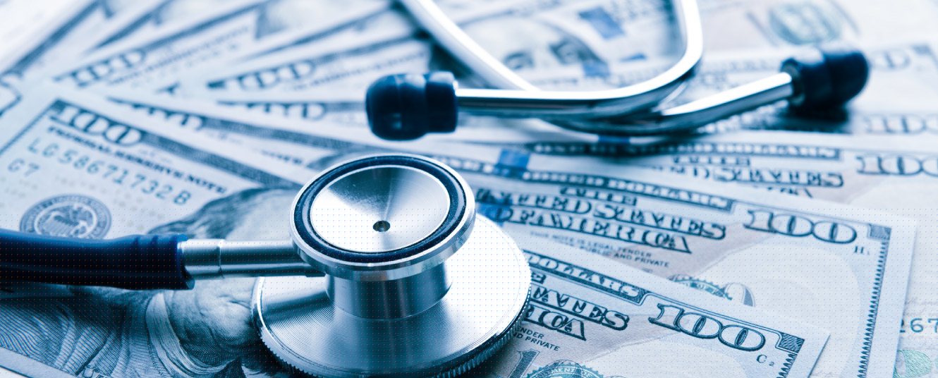 stethoscope on top of money