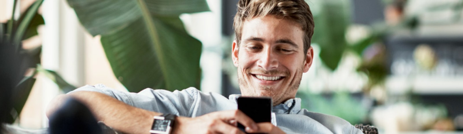 Man using smartphone.