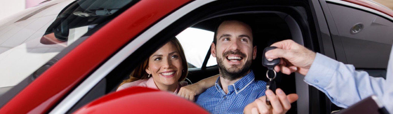 someone driving a new car