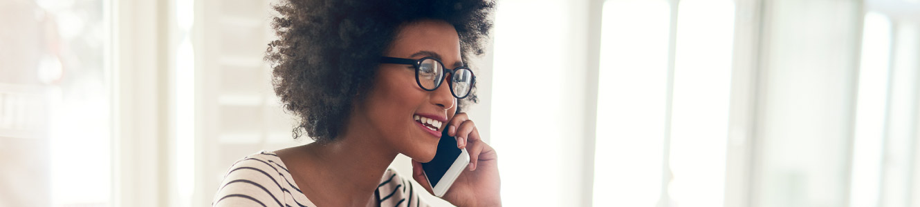 Woman talking on phone.