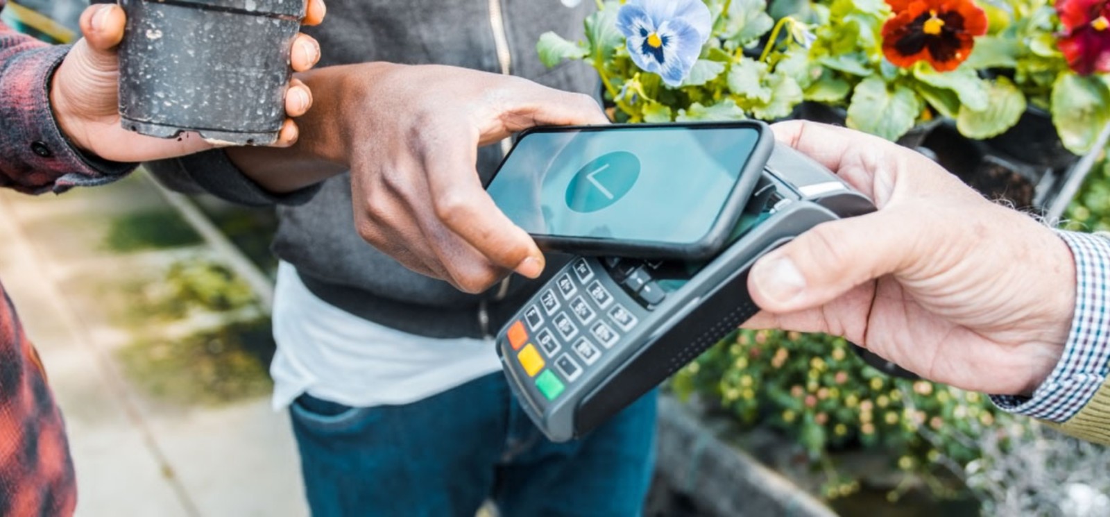 person using phone to pay