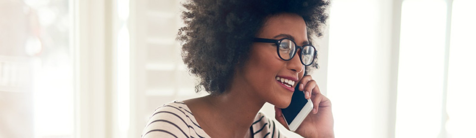 Woman talking on phone.