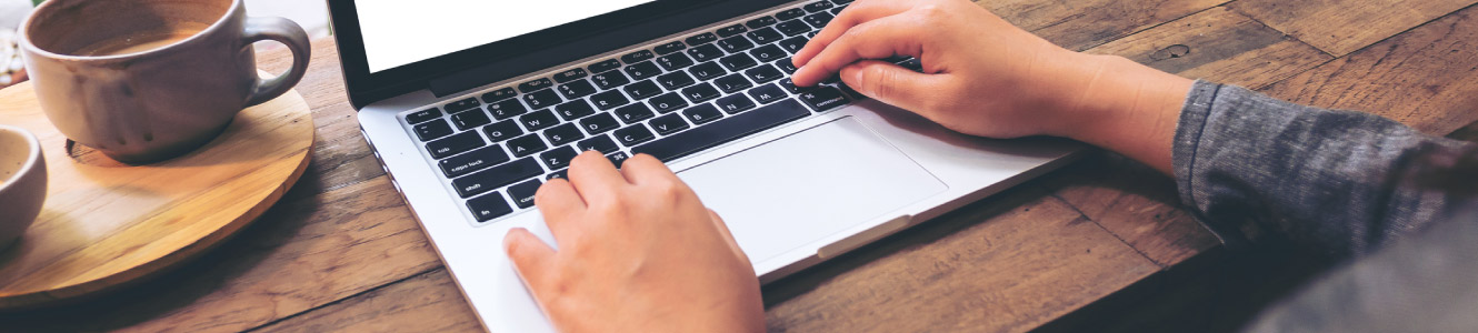 Person typing on a computer