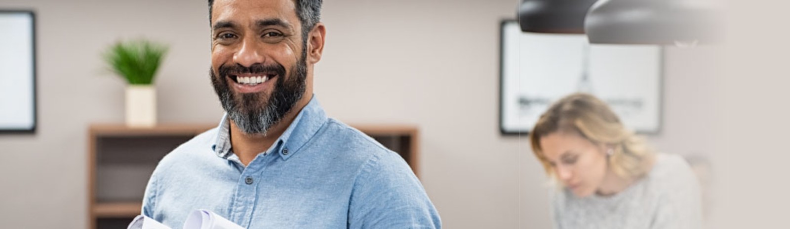 Man and women in business office