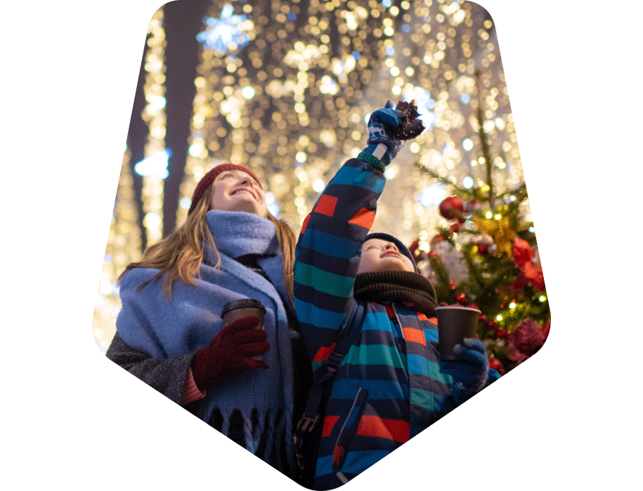 mom and child looking at lights