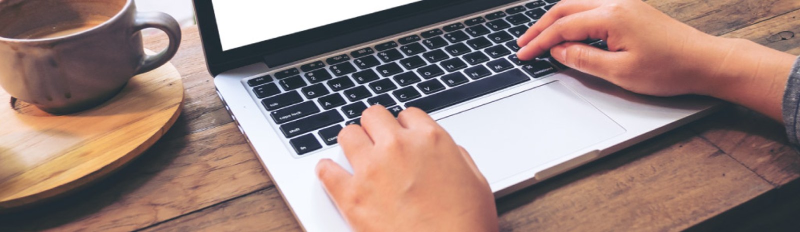 Person typing on a computer